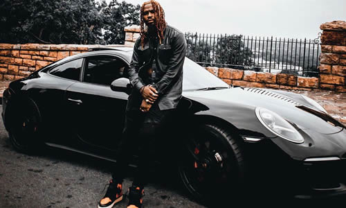 Stilo Magolide standing next to his new Mazda MX-5 car